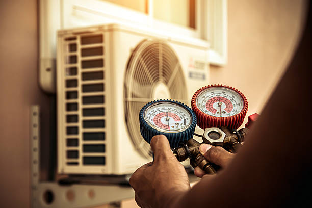 Professional Heat Pump Repair technician working in Orland, IN